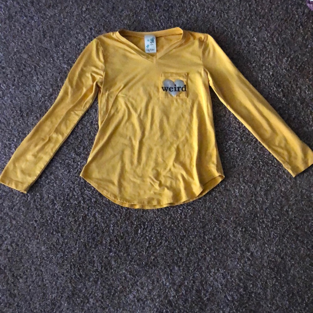 Hello!this is a shirt the brand is lily blue it’s is a yellow-ish with orange!